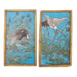 A pair of Chinese cloisonne enamel rectangular plaques decorated with cranes amongst reeds on a