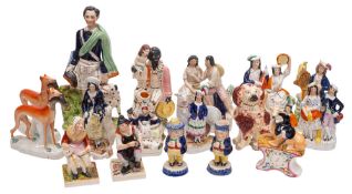 A mixed group of Staffordshire figures, including Uncle Tom and Eva, Prince of Wales,
