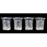 Four Lalique 'Les Enfants' liqueur or shot glasses each with a frosted and moulded panel depicting
