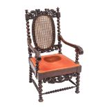 A Charles II walnut and canework elbow chair,