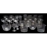 A mixed group of drinking glasses, comprising eight hollow stem champagne bowls, seven rummers,