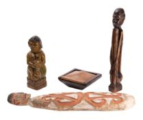 A group of three Balinese carved and painted wood figures and a Balinese palm wood box and sliding
