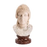 A sculpted white marble bust of a youthful Ares, probably a Roman 2nd century A.D.