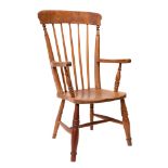 An ash, beech and oak spindle back elbow chair,