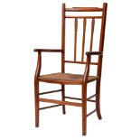 A stained hardwood and rush seated open elbow chair,