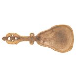 An Inuit carved reindeer horn spoon, the pear-shaped bowl with incised decoration of a reindeer,