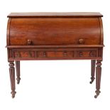 A Regency mahogany cylinder bureau, early 19th century; with rectangular top above the roll front,