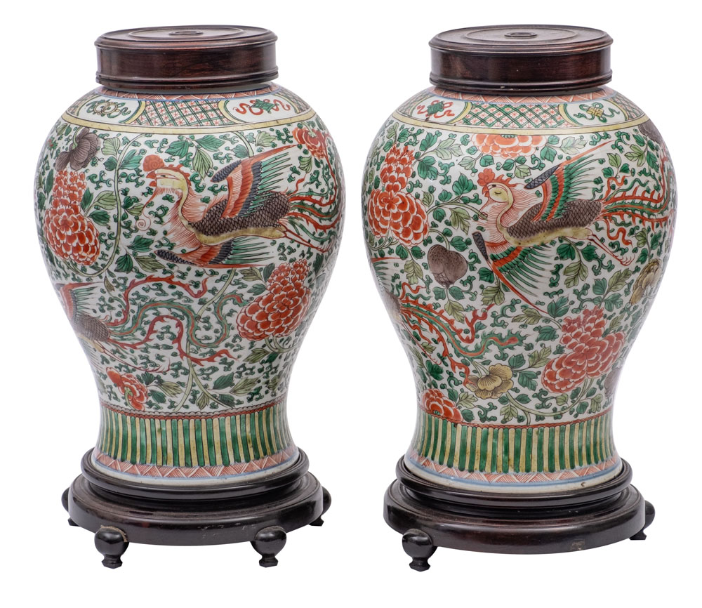 A pair of Chinese wucai 'Phoenix' jars of baluster form,