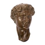 After Michelangelo Buonarroti, a bronze model of the head of David,