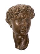 After Michelangelo Buonarroti, a bronze model of the head of David,