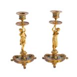 A pair of Louis XV style gilt bronze and champleve enamel candlesticks: with urn-shaped sconces