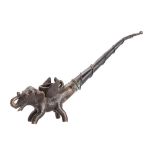 A Thai bronze and copper elephant opium pipe the long stem bound with wirework, 22cm.
