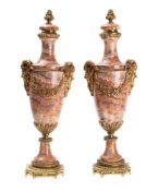 A pair of Continental alabastro fiorito and gilt metal mounted twin handled urns,