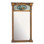 A Regency giltwood pier mirror of rectangular shape with a moulded cornice of recessed broken