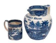 An English blue and white pearlware commemorative jug and a similar mug,