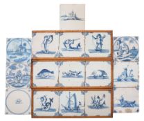 A collection of English and Dutch blue and white delftware tiles in three frames and loose,