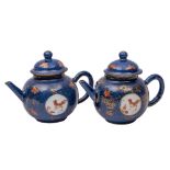 A pair of Chinese porcelain miniature teapots and covers,