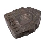 A Tibetan Buddhist portable metal shrine [Gau] of arched form with foliate repousse decoration,