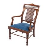 An Edwardian mahogany and marquetry open elbow chair,
