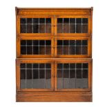 An oak and glazed bookcase by Minty Ltd of Oxford,