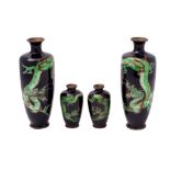 A pair of Japanese cloisonne vases and a matching smaller pair all decorated with a sinuous scaly