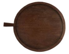A large treen board, probably walnut, 19th century; probably for culinary use,