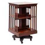 A Victorian mahogany revolving bookcase, late 19th century; of square section,