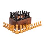 Jaques, London; a boxwood and ebony Staunton pattern weighted chess set,