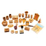 A collection of approx thirty assorted pieces of Mauchline ware, includes napkin rings,