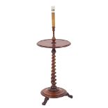 A Victorian mahogany circular lamp table, adapted for electric light,