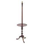 A mahogany standard lamp in George III taste,