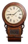 An early 20th century American drop dial wall clock having an eight-day duration movement striking