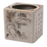 A Chinese square-section brush pot enamelled in iron-red and en grisaille with landscapes and