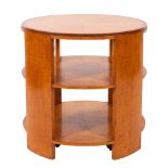 A maple and crossbanded circular library occasional table in Art Deco taste;