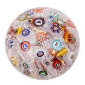 A dated Baccarat spaced millefiori paperweight,