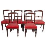 A set of six Victorian mahogany and red leather upholstered dining or side chairs,