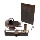 A small quantity of domestic metalware, 19th century; comprising an iron trivet fender,