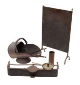 A small quantity of domestic metalware, 19th century; comprising an iron trivet fender,