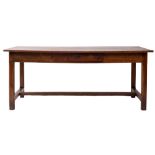 A chestnut farmhouse table, possibly French,