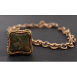 A 9ct gold, fancy-link bracelet and gilt metal bloodstone seal fob,