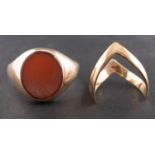 An oval carnelian signet ring, stamped '9CT', length of ring head ca. 1.