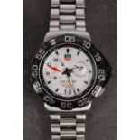 WITHDRAWN LOT Tag Heuer a gentleman's Formula 1 alarm wristwatch the silvered dial with subsidiary
