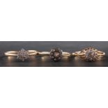 Three diamond cluster rings, including a 9ct gold ring, total diamond weight stamped 0.