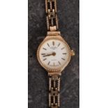 Rotary a lady's wristwatch the white dial with raised gold baton numerals and hands and signed
