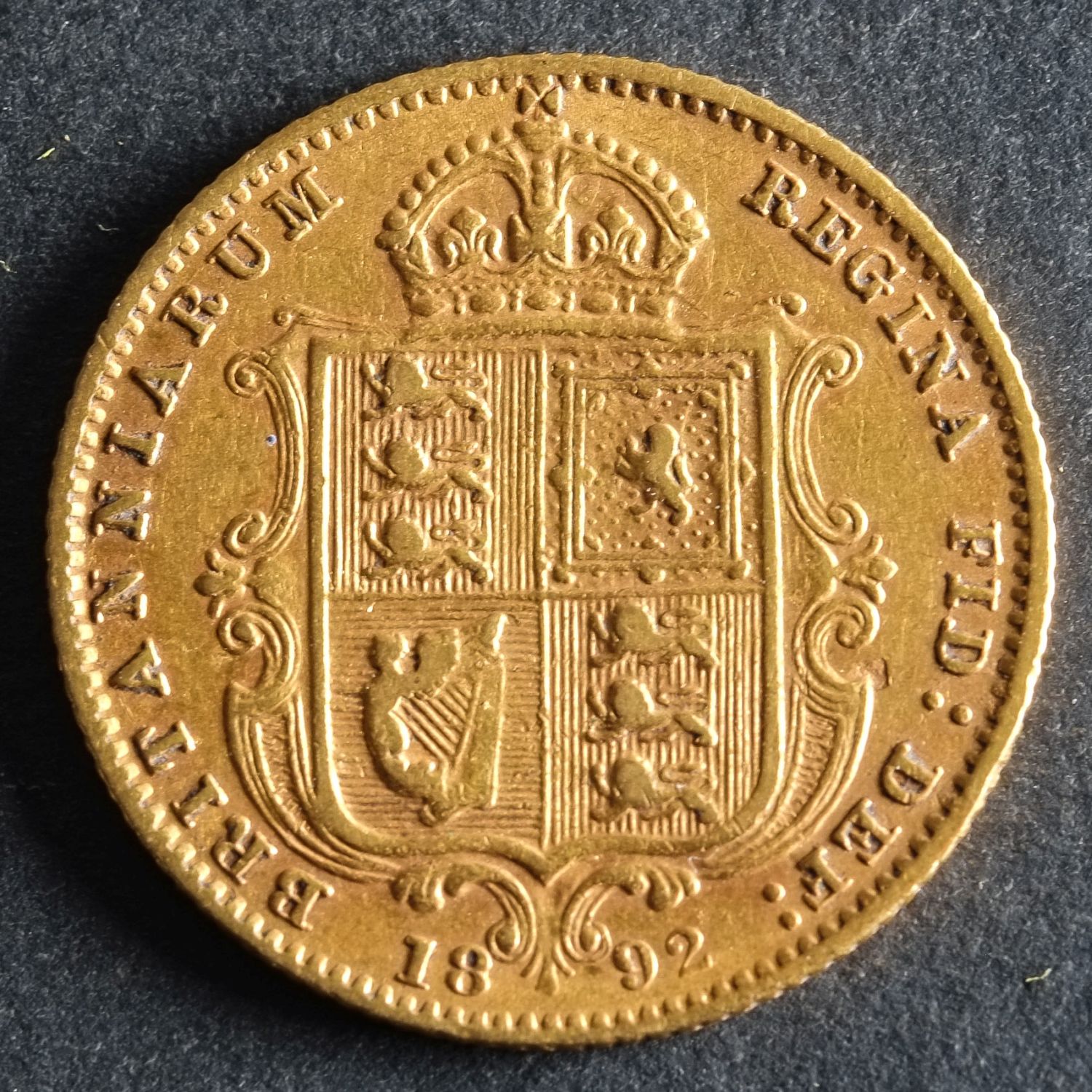 An 1892 Victorian half sovereign.