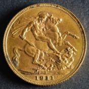 A 1911 Georgian Gold Sovereign.