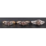 Three round, brilliant-cut diamond rings, including a ring marked '14K',