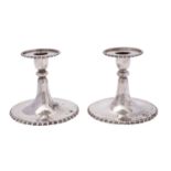 A pair of Edward VIII silver dressing table candlesticks, Elkington and Co, London,
