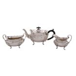 A George V silver three piece silver teaset, maker Hawksworth, Eyre and Co Ltd, Birmingham 1934,