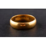 A 22ct. gold band ring, ring size J, total weight ca. 5.3gms.